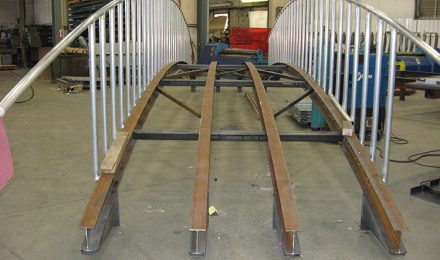 Custom fabricated metal bridge side view