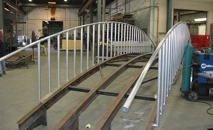 Custom fabricated metal bridge back view