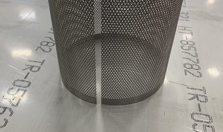 Perforated stainless steel basket