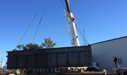 Custom fabricated TVA containment tank being loaded on truck